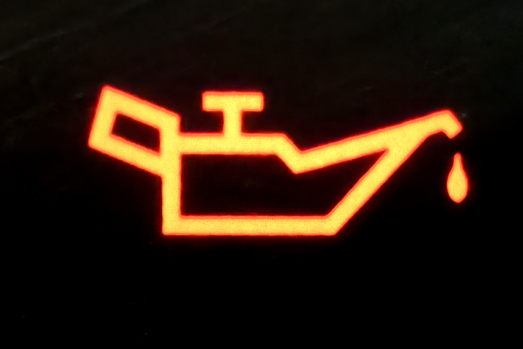 quando a luz do óleo acende mas tem óleo